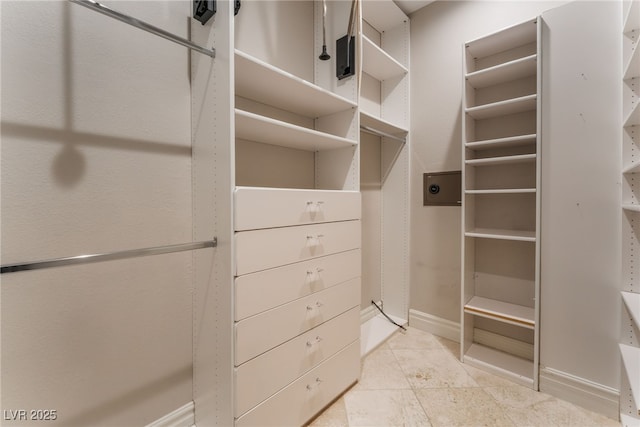 2221 Glenbrook Way, Las Vegas, NV 89117 - walk in closet with light tile patterned floors