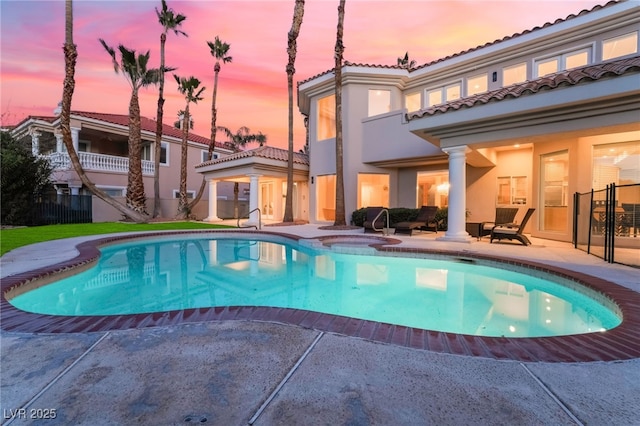 2221 Glenbrook Way, Las Vegas, NV 89117 - view of swimming pool featuring a patio area, a pool with connected hot tub, and fence