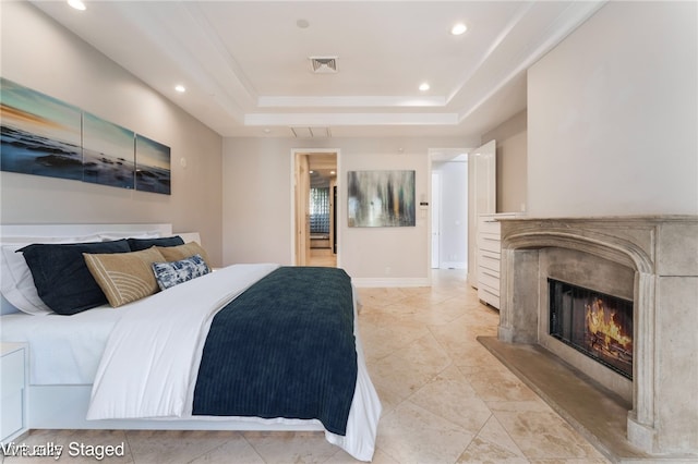 2221 Glenbrook Way, Las Vegas, NV 89117 - bedroom featuring visible vents, baseboards, a tray ceiling, a premium fireplace, and recessed lighting