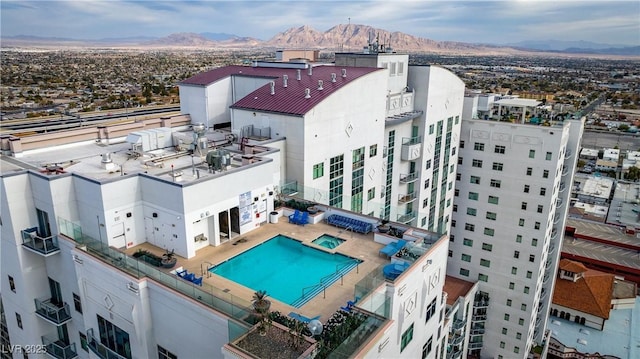 150 Las Vegas Blvd Unit 1711, Las Vegas, NV 89101 - drone / aerial view of a pool and a mountainous background