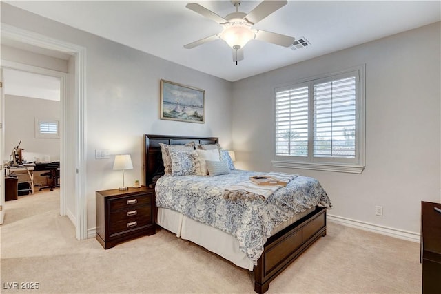 bedroom featuring visible vents, light carpet, baseboards, and a ceiling fan