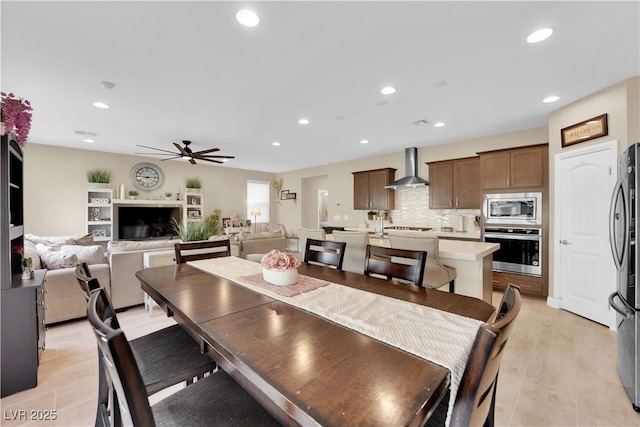 dining area with recessed lighting and ceiling fan