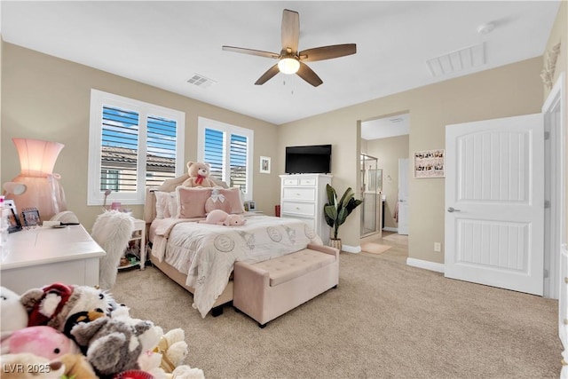 bedroom featuring visible vents, baseboards, light colored carpet, and ceiling fan