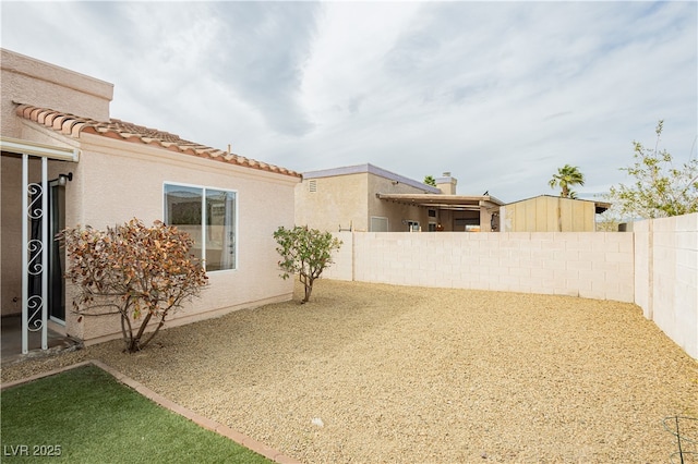 view of yard with a patio area and fence