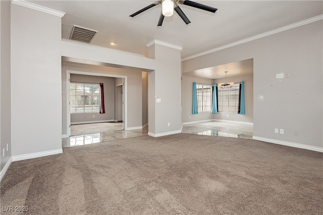 carpeted empty room with visible vents, a ceiling fan, baseboards, and ornamental molding