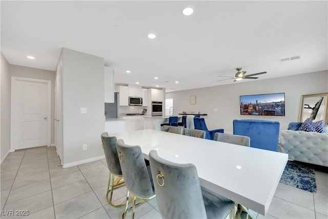 dining area with a ceiling fan, light tile patterned flooring, recessed lighting, and visible vents