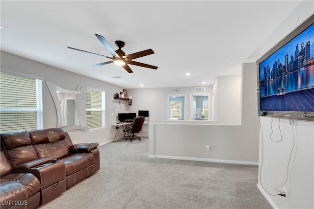 carpeted living room with visible vents, recessed lighting, and baseboards