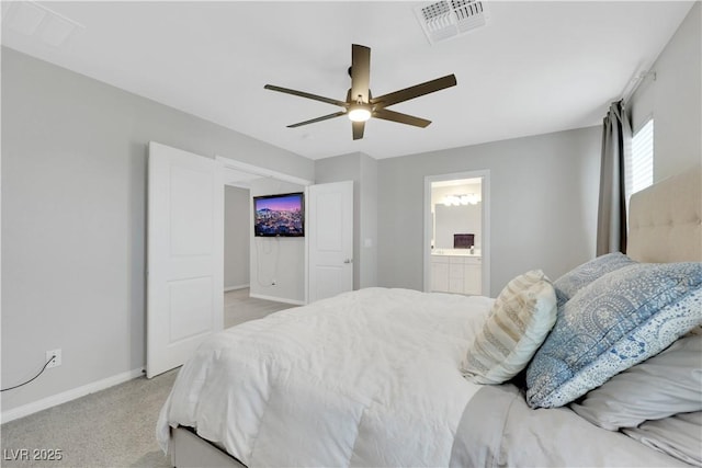 bedroom with visible vents, connected bathroom, baseboards, light carpet, and a ceiling fan