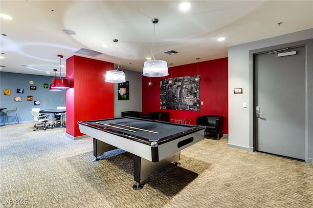 rec room with carpet, visible vents, and baseboards