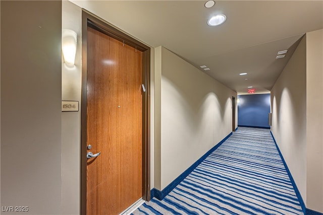 corridor featuring recessed lighting