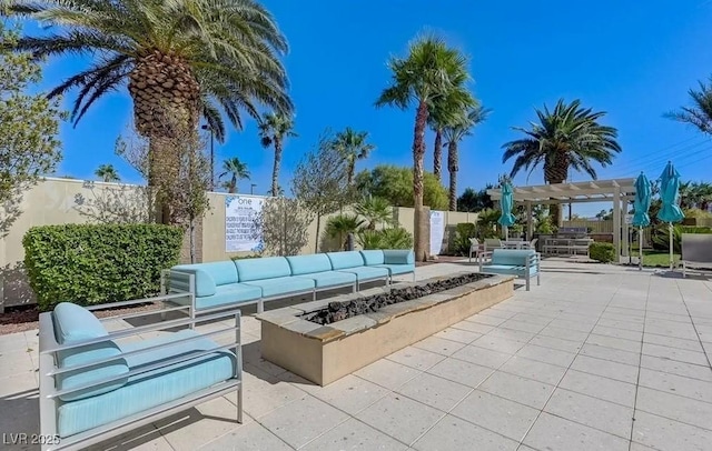 view of patio / terrace featuring a fenced backyard, a pergola, and an outdoor hangout area