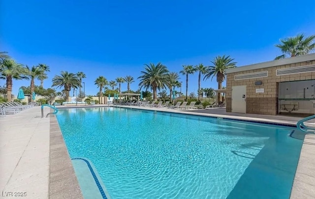 community pool with a patio