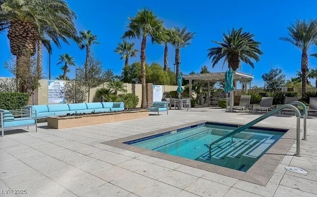 view of pool with an outdoor hangout area, a pergola, a patio, and fence