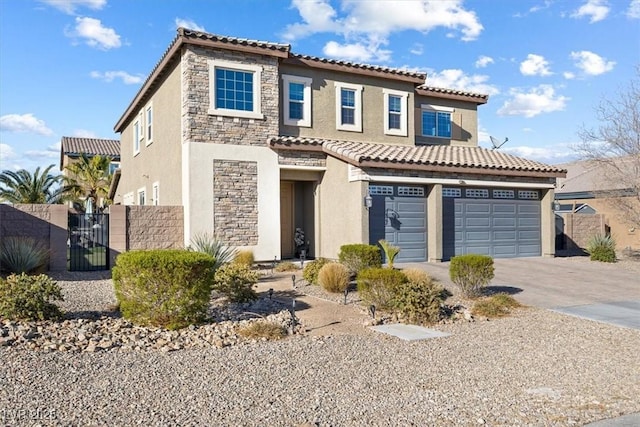 view of front of property with a gate, fence, driveway, a garage, and stone siding