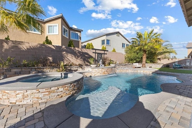 view of swimming pool with a fenced in pool, an in ground hot tub, and fence