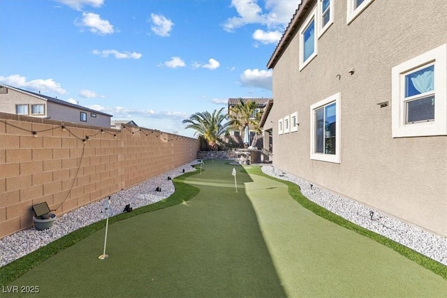 view of yard with a fenced backyard