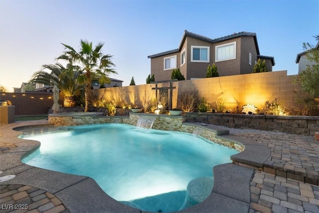 view of pool with a fenced in pool, a patio, and a fenced backyard