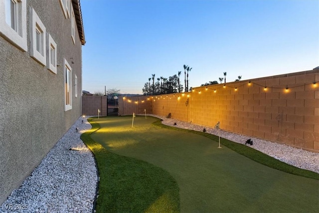 view of yard featuring a fenced backyard