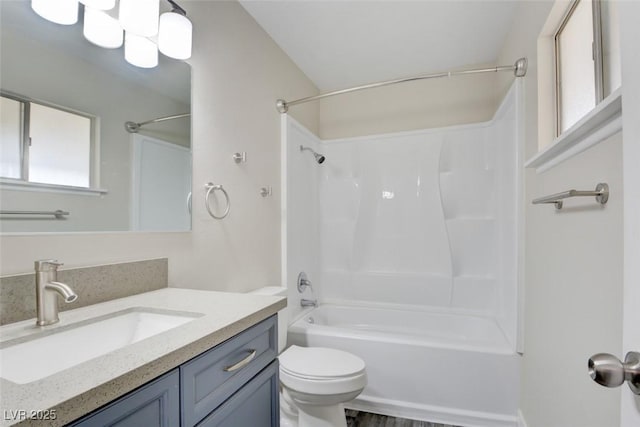 full bath with vanity, bathing tub / shower combination, and toilet