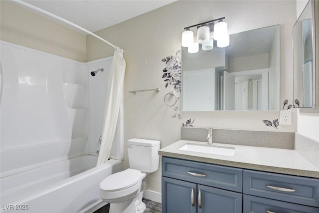 bathroom featuring vanity, toilet, and shower / tub combo