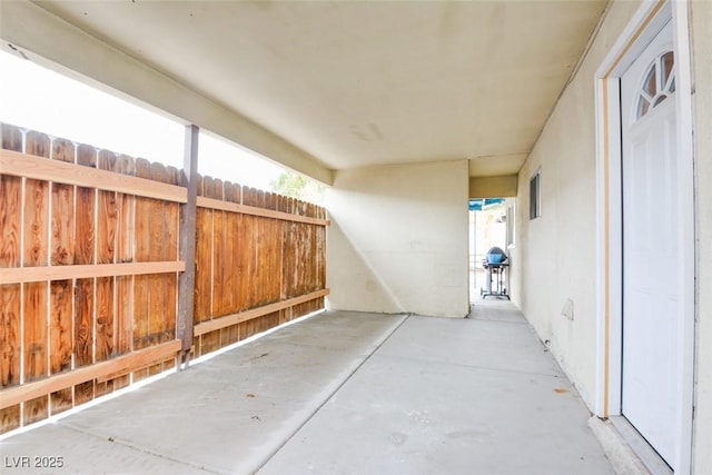 view of patio with fence