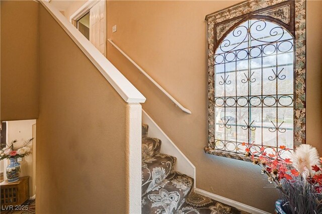 stairway with baseboards