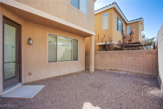 view of yard with a patio and fence