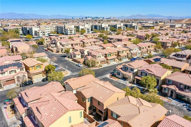 bird's eye view featuring a residential view and a mountain view