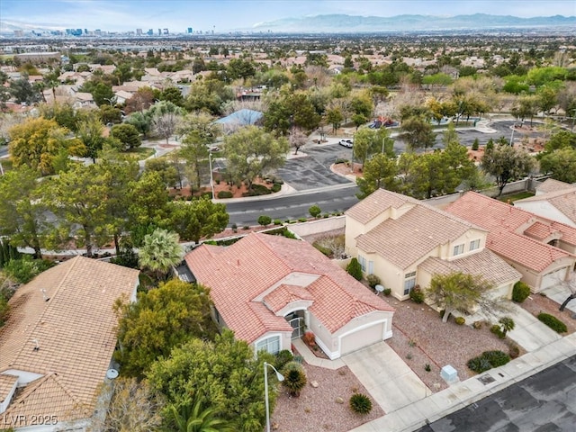 drone / aerial view with a mountain view and a residential view