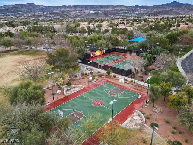 birds eye view of property with a mountain view