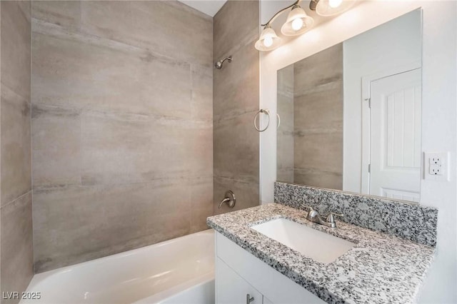 bathroom with vanity and shower / bath combination