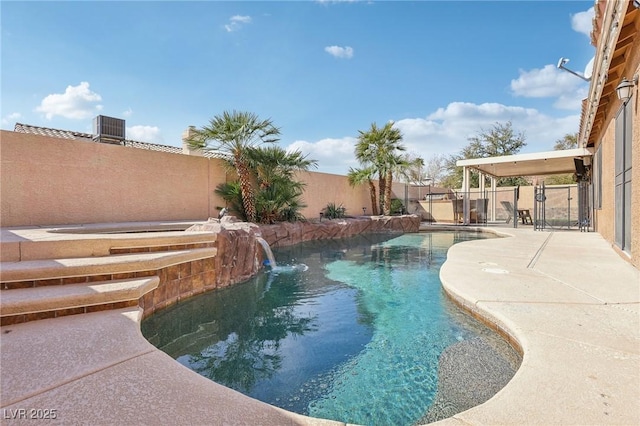 view of pool featuring a patio area, a fenced backyard, a fenced in pool, and central AC