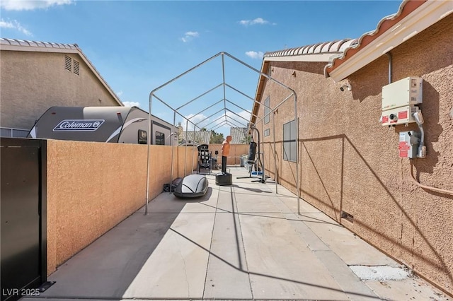 view of patio / terrace featuring fence private yard