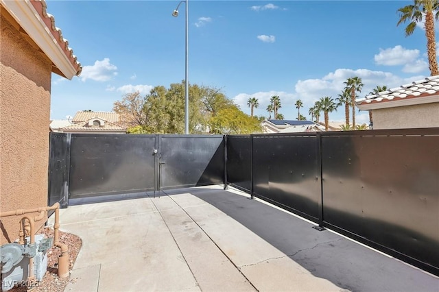 view of patio / terrace with a gate