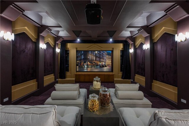 cinema featuring coffered ceiling