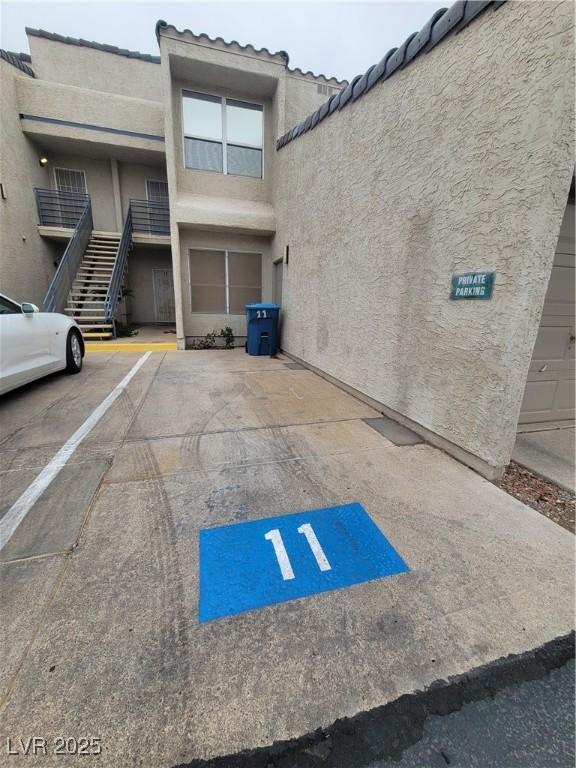 uncovered parking lot with stairway