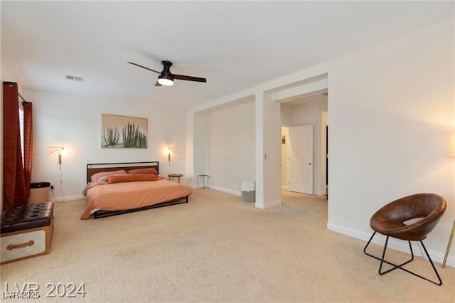 bedroom featuring visible vents, ceiling fan, baseboards, and carpet floors