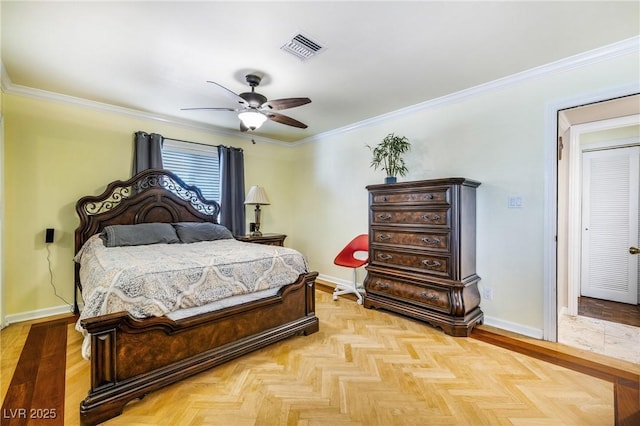 bedroom featuring visible vents, crown molding, and baseboards