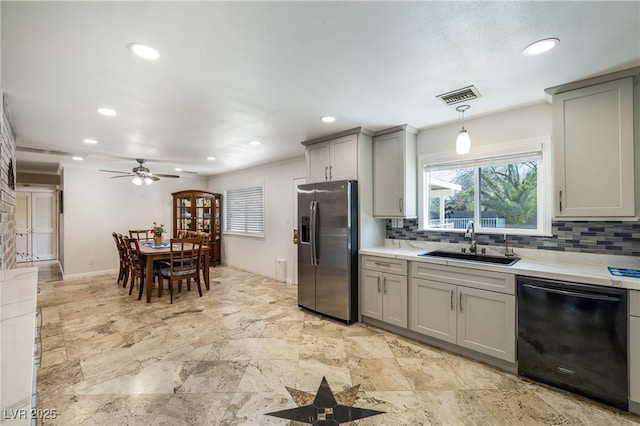 kitchen featuring dishwasher, gray cabinets, visible vents, and stainless steel fridge