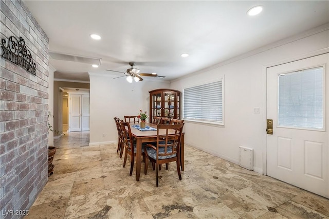 dining space with recessed lighting, a ceiling fan, baseboards, and ornamental molding