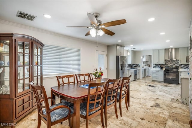 dining room with recessed lighting, visible vents, and ornamental molding