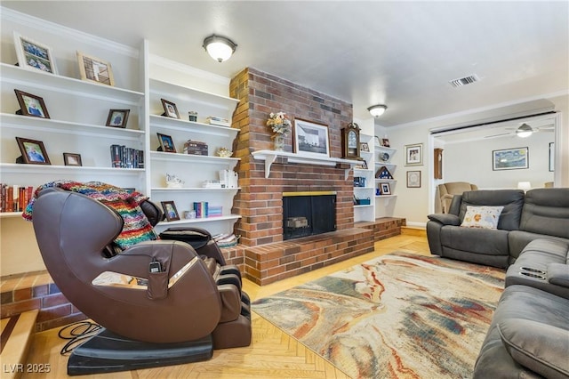 living area featuring built in features, a fireplace, visible vents, and ornamental molding