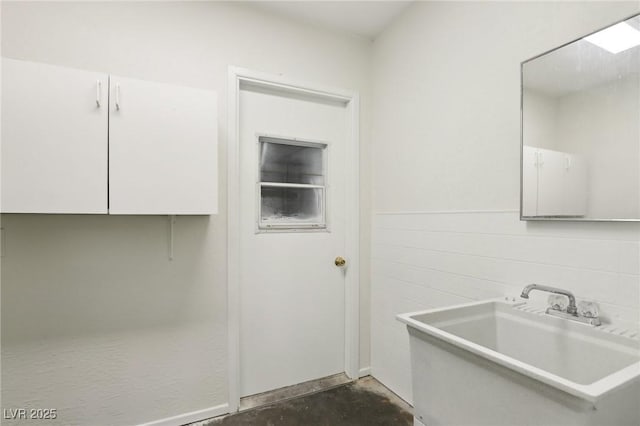 laundry room with a sink