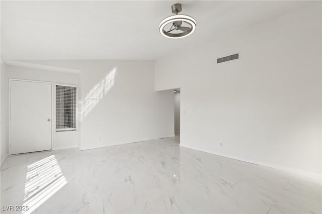 unfurnished living room with visible vents, marble finish floor, and baseboards