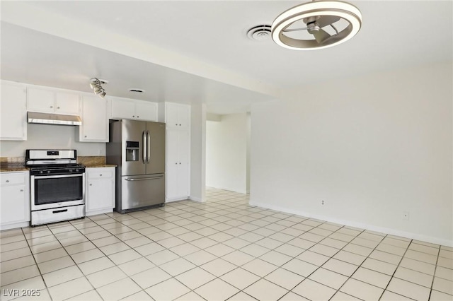 kitchen with visible vents, white cabinets, under cabinet range hood, appliances with stainless steel finishes, and dark countertops