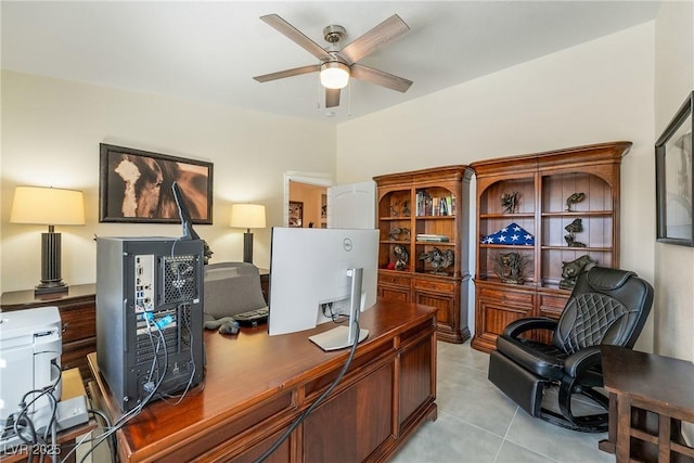 office with light tile patterned floors and a ceiling fan