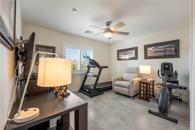 workout area featuring visible vents, baseboards, and ceiling fan