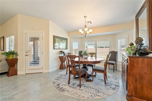 dining area with an inviting chandelier, baseboards, and visible vents