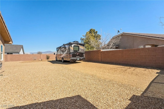 view of yard featuring a fenced backyard