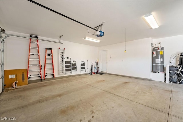 garage with a garage door opener and water heater